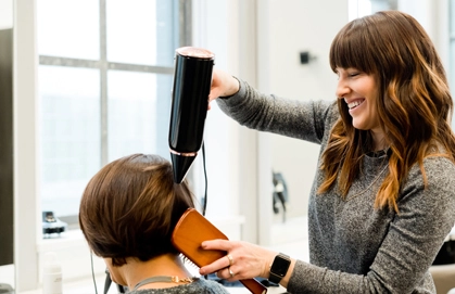 a-girl-with-hair-dryer-Best-salon-in-kochi